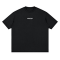 Black t-shirt with a small white logo on a white background